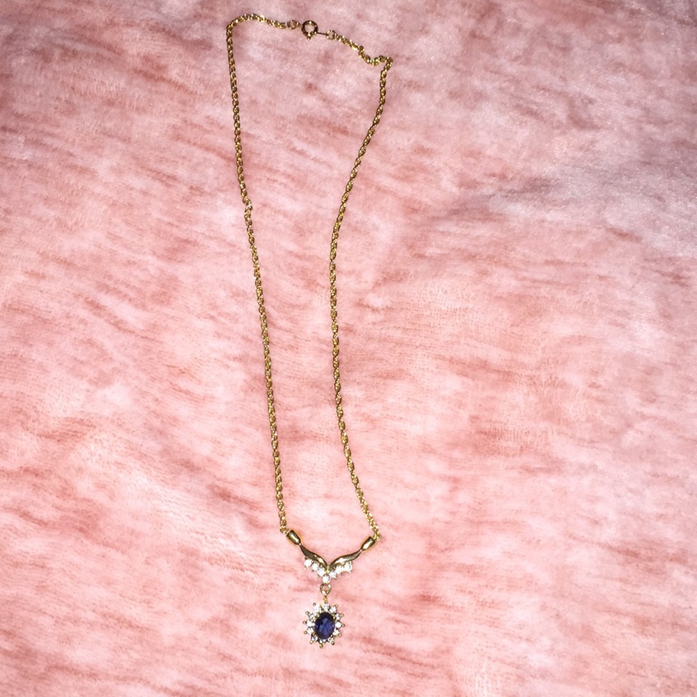 Roman gold necklace with sapphire detail.